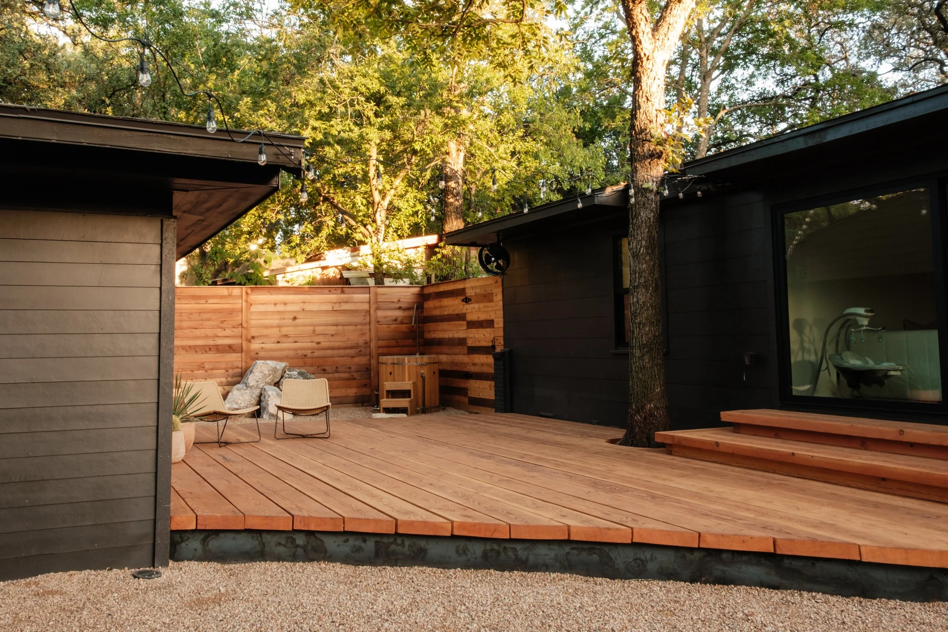 BigDecks wood deck connecting a garden courtyard